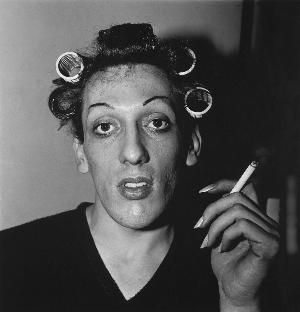 Diane Arbus, A young man in curlers at home on West 20th Street, New York, 1966