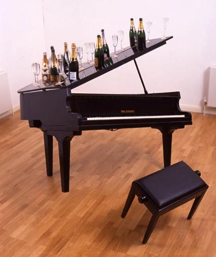 James Hopkins, Tipping the Scale, 2004, Piano, stool, bottles and glasses (balanced), 150 x 170 x 135 cm