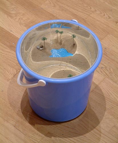 James Hopkins, Mirage in Mind, 2004, Bucket, mirror, sand, pebbles and model trees, 30 x 30 x 28 cm